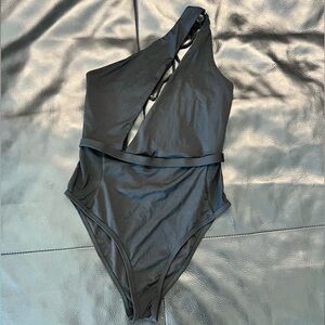 1 piece swimsuit with adjustable straps and tie back detail